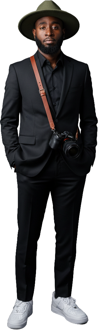 Marquise Johnson in his black suit and hat, with his camera.